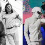 Daft Punk members Thomas Bangalter and Guy-Manuel de Homem-Christo wearing their signature silver and gold robot helmets.
