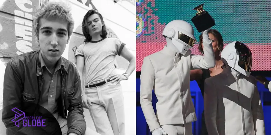 Daft Punk members Thomas Bangalter and Guy-Manuel de Homem-Christo wearing their signature silver and gold robot helmets.