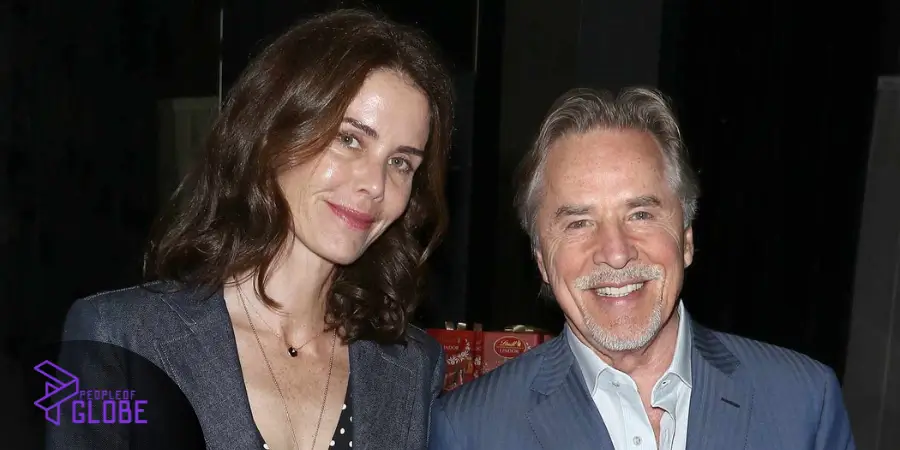 Don Johnson and Kelley Phleger, the parents of Jasper Breckenridge Johnson, posing together at an event.