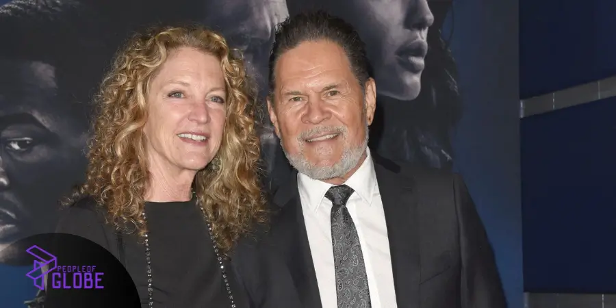 Leslie Bryans and husband A Martinez arriving together at a high-profile Hollywood red carpet premiere.