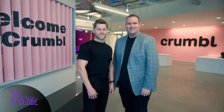 Crumbl Cookies co-founders Sawyer Hemsley and Jason McGowan posing together at a corporate event.
