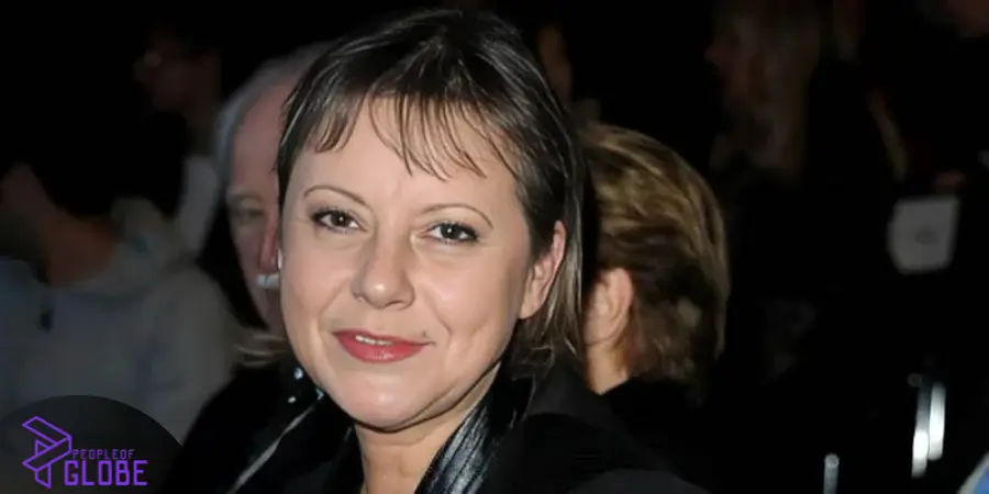 An informational close-up portrait of French comedy icon and actress Chantal Lauby smiling at an industry function.