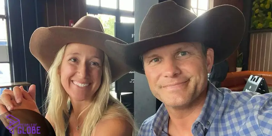 A close-up selfie of a blonde woman and a man both smiling and wearing brown cowboy hats.